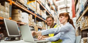 Warehouse worker monitoring on their laptops
