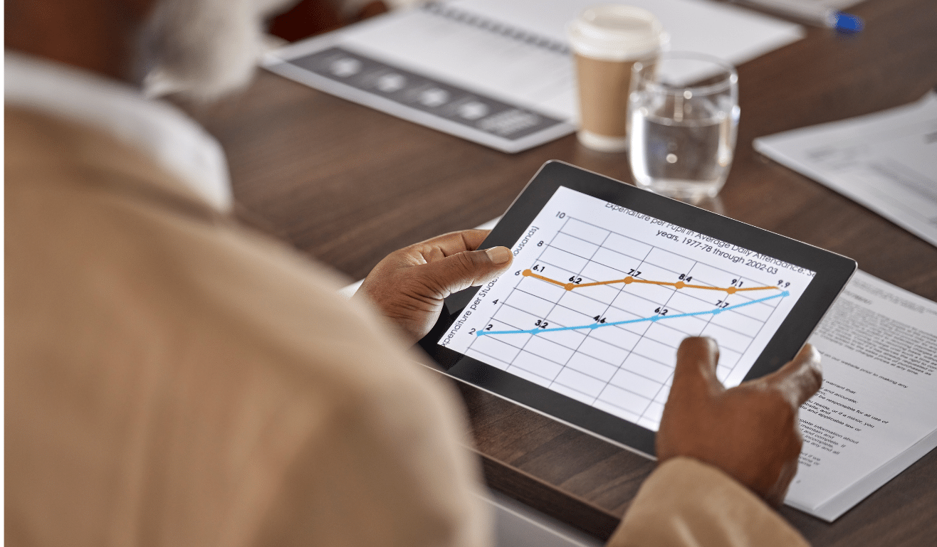 A men looking charts on a table